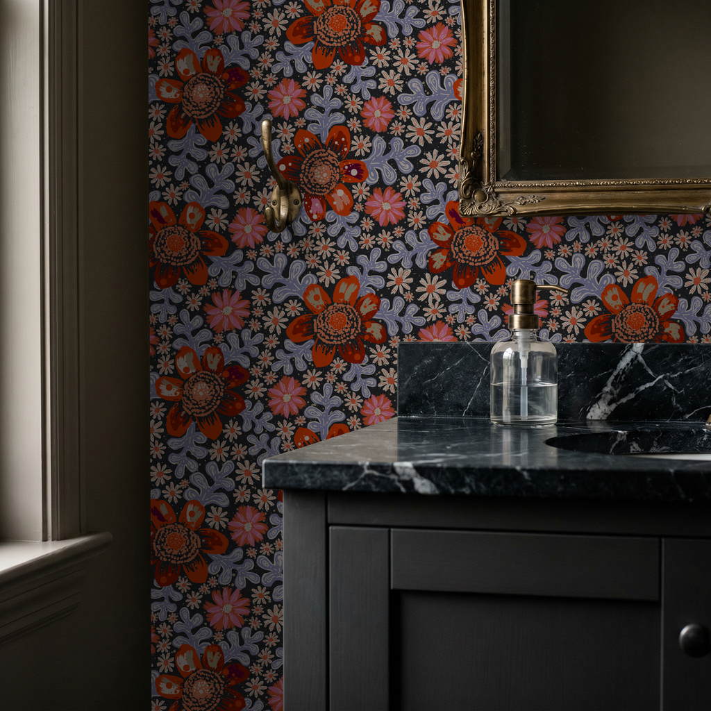 Bold floral wallpaper with red and coral flowers in a bathroom setting.
