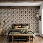 Botanical Dutch iris and moth wallpaper in rustic bedroom setting.