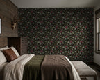 Carnations Chintz wallpaper with pink and sage floral pattern in rustic bedroom.