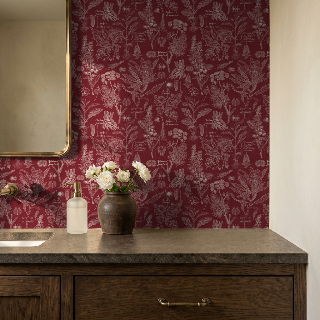 Crimson botanical wallpaper with intricate plant illustrations in a bathroom setting.