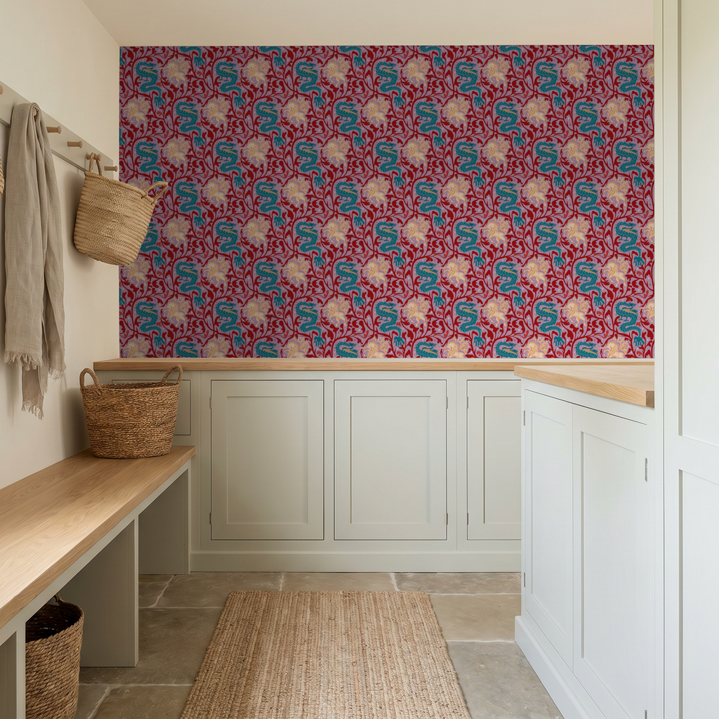 Crimson wallpaper with teal dragons and golden unicorns in a cozy room setting.