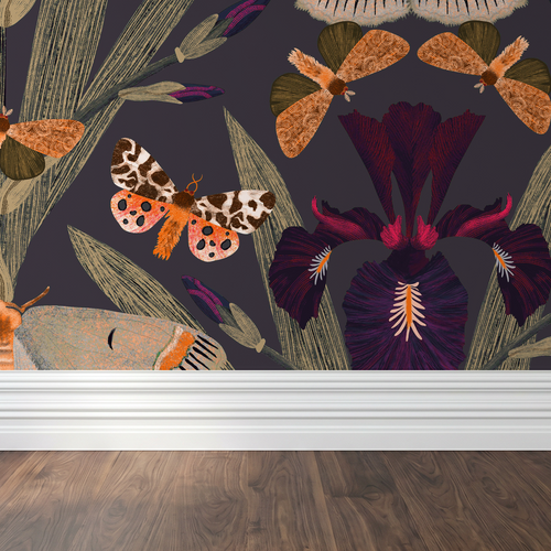 Dark purple wallpaper with moths and Dutch irises in a botanical pattern.