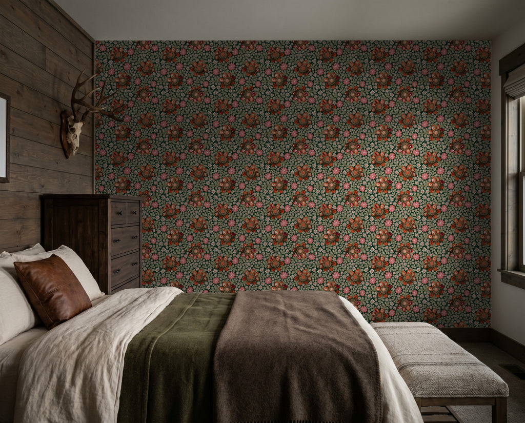 Floral wallpaper with peach, beige, and moss colors in a cozy bedroom setting.