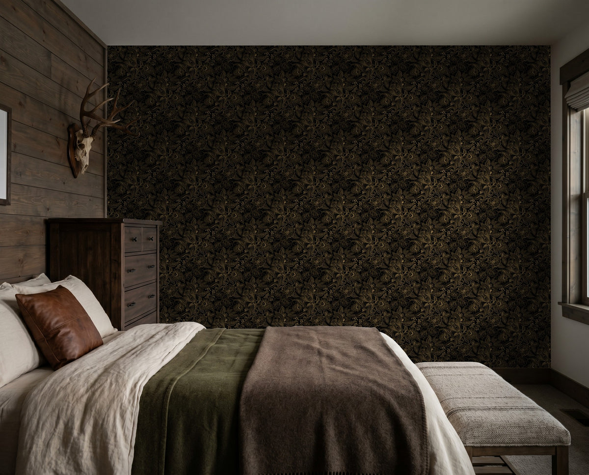 Gold and black floral paisley wallpaper in a cozy bedroom setting.