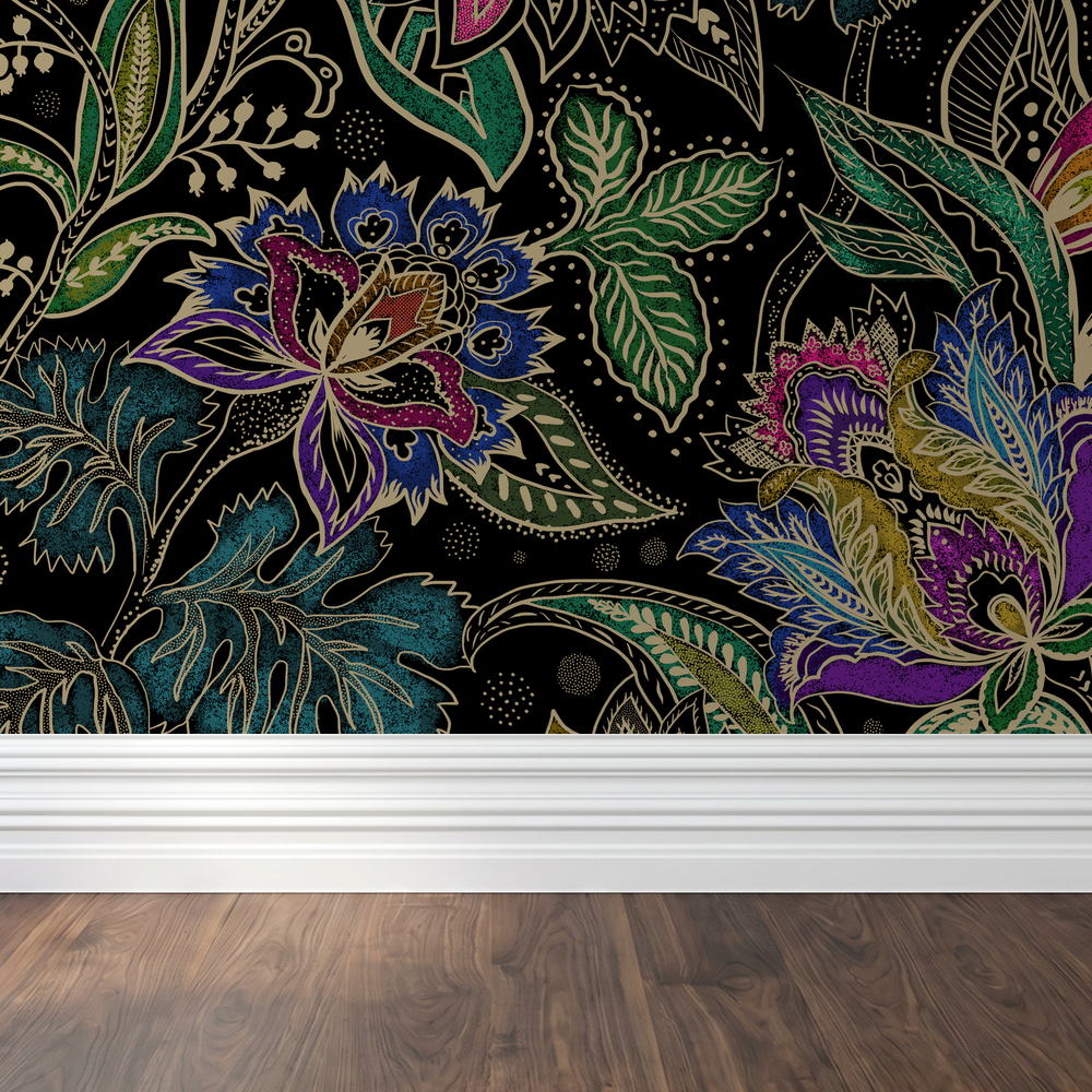 Intricate floral wallpaper with vibrant colors on a black background in a room setting.