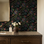 Jacobean floral wallpaper with pink, ruby, and black in a bathroom setting.