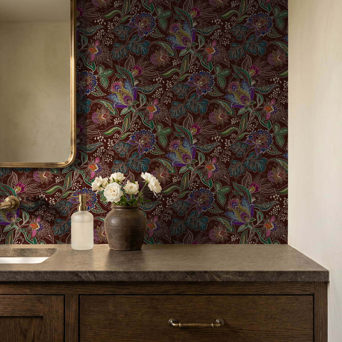 Jacobian floral wallpaper with emerald, burgundy, and red in a bathroom setting with vanity.