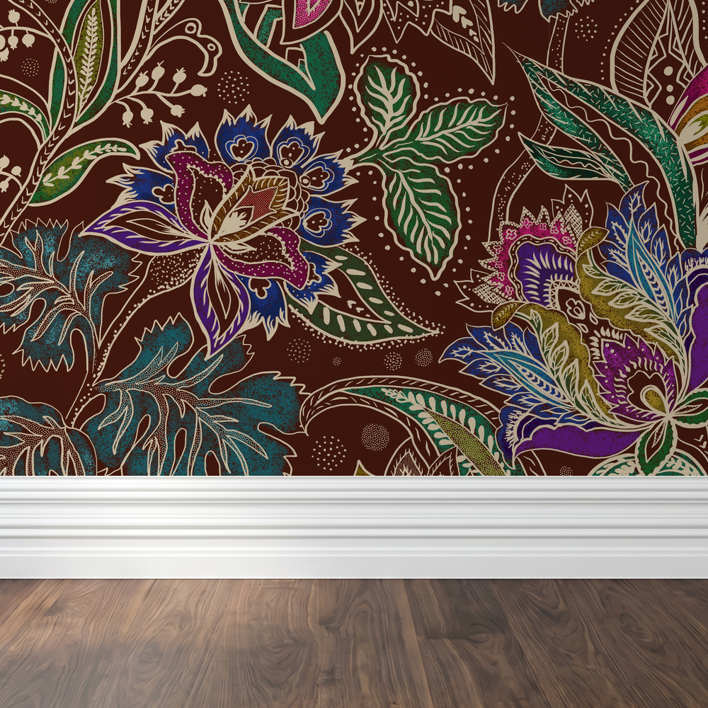 Jacobian floral wallpaper with emerald, burgundy, and red motifs on a rich rust background.