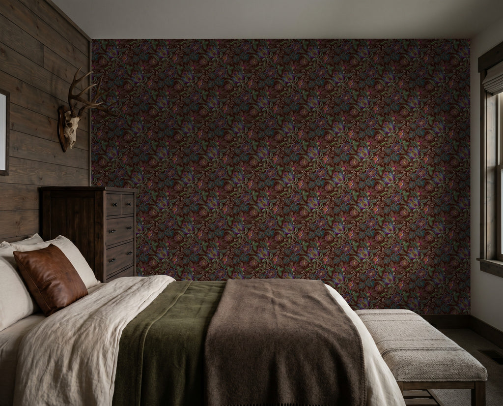 Jacobian Floral wallpaper in emerald, burgundy, and red in a rustic bedroom setting.
