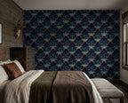 Moody navy wallpaper with moth and iris pattern in rustic bedroom setting.