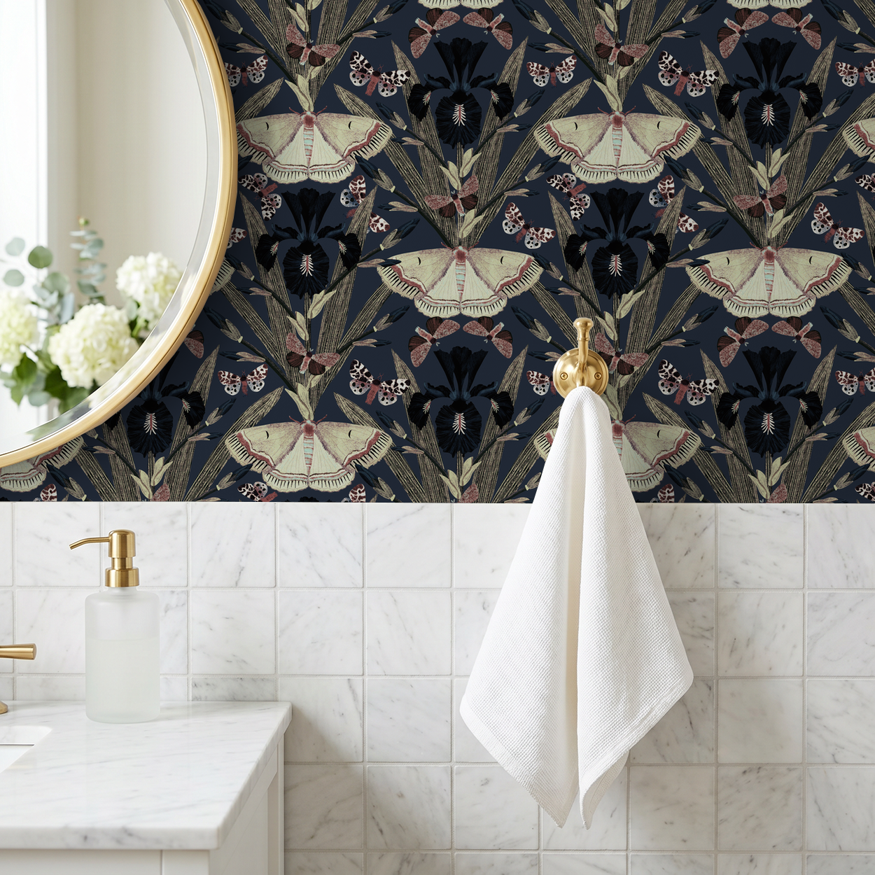 Navy wallpaper with moth and iris design in elegant bathroom setting.