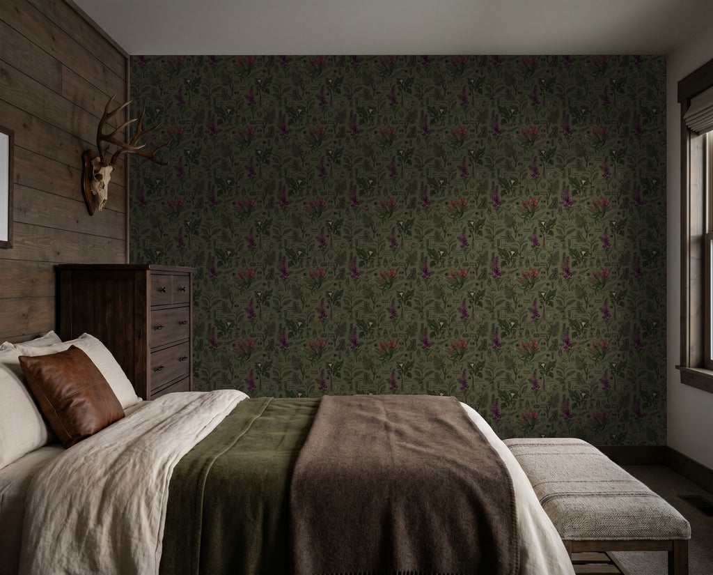 Olive and charcoal botanical wallpaper in rustic bedroom setting