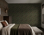 Olive and charcoal botanical wallpaper in rustic bedroom setting