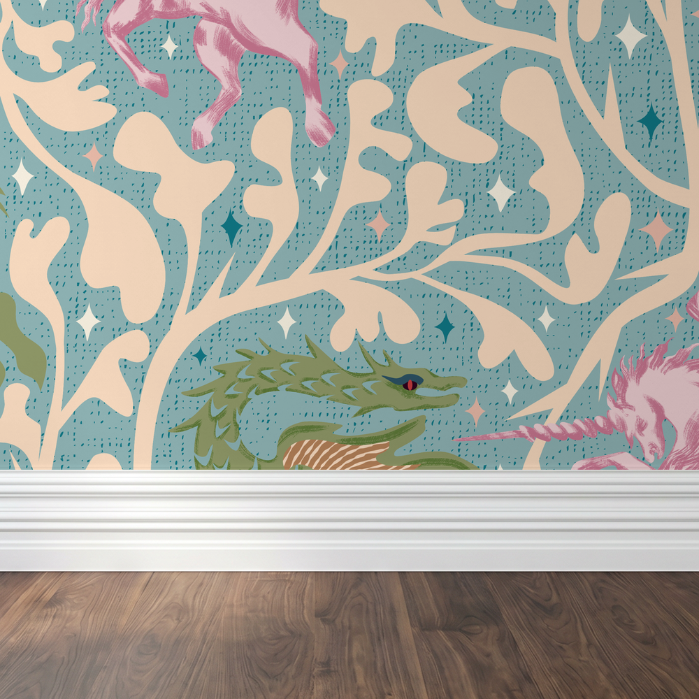 Teal wallpaper with pink unicorns and green dragons on a vine pattern.