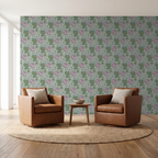 Teal and peach dragon wallpaper in a living room with brown chairs.