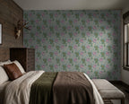 Teal and peach dragon wallpaper in rustic bedroom with wooden furniture.