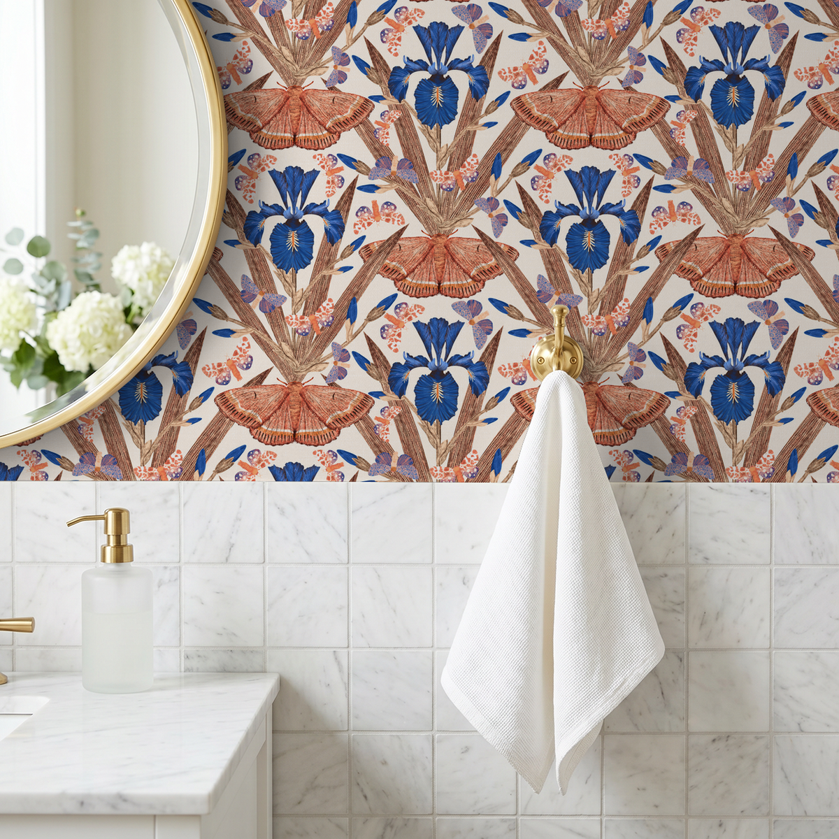 Terracotta and navy floral wallpaper with irises and moths in a bathroom setting.