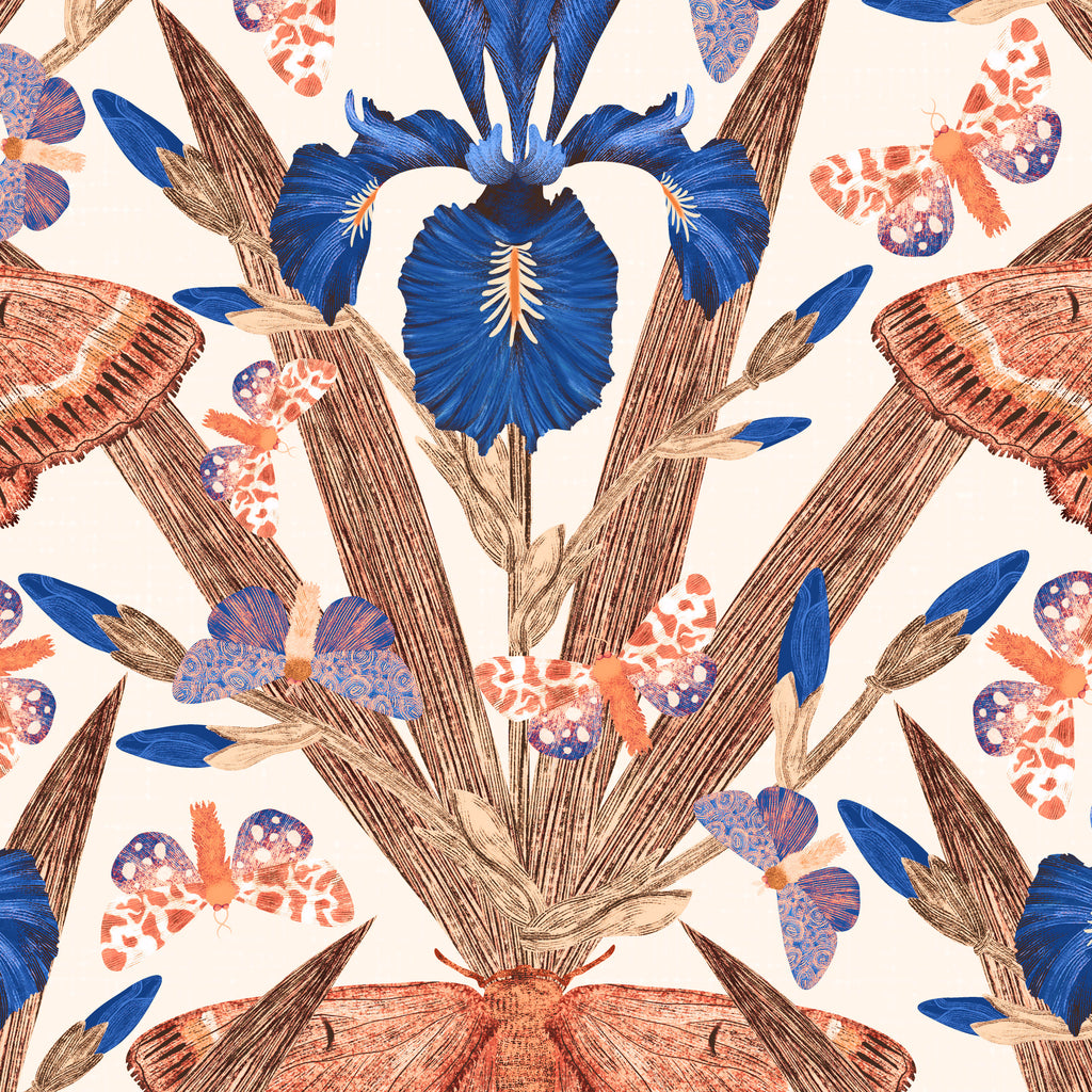 Terracotta and navy iris and moth wallpaper with cream background.