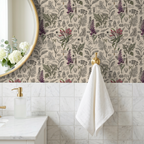 Vintage botanical wallpaper with purple and green plants in elegant bathroom.