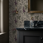 Vintage botanical wallpaper with purple and green plants in elegant bathroom setting.