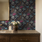 Vintage floral wallpaper with teal, gold, magenta flowers in a bathroom setting.